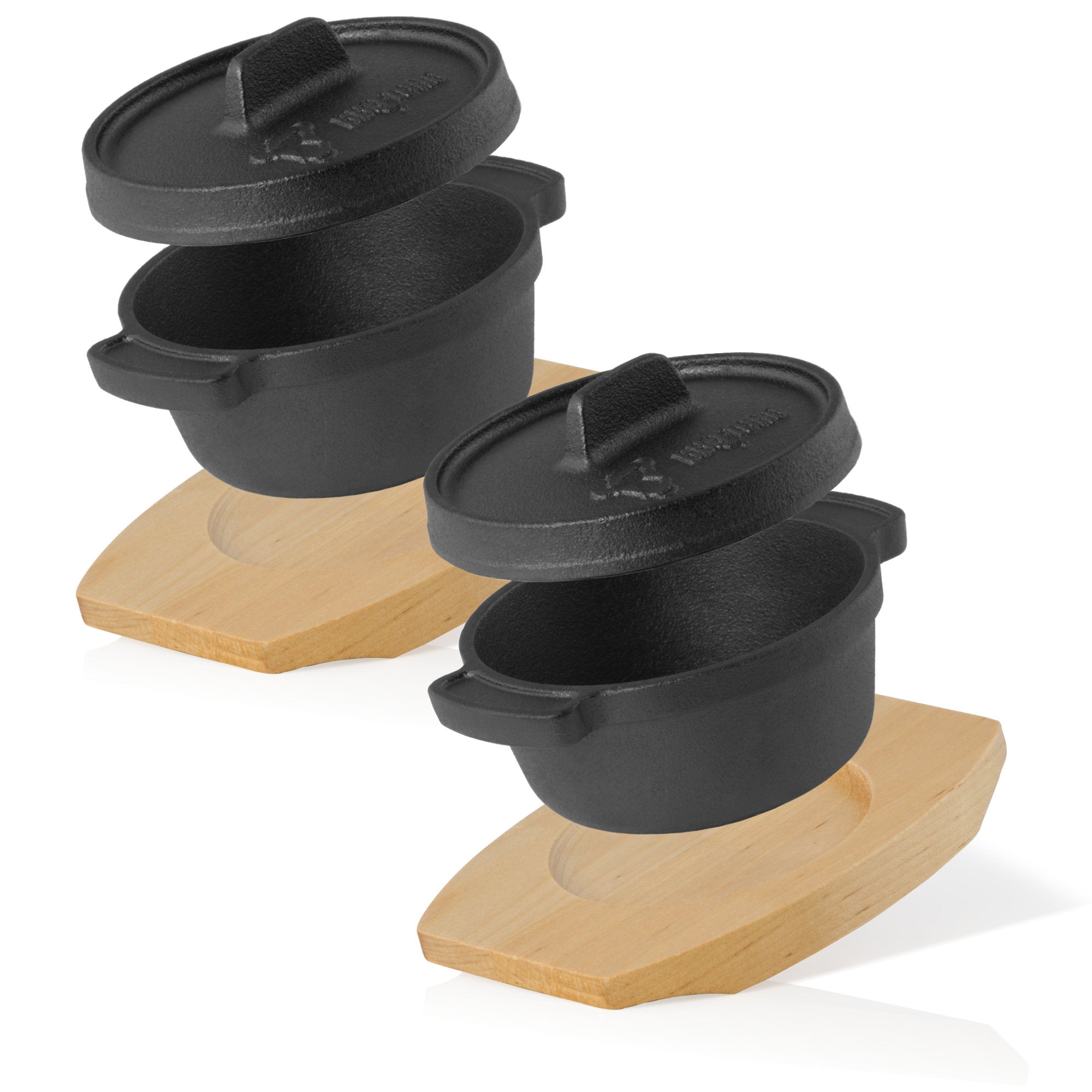 Mini cocotte en fonte, Ø 11 cm, avec socle en bois.