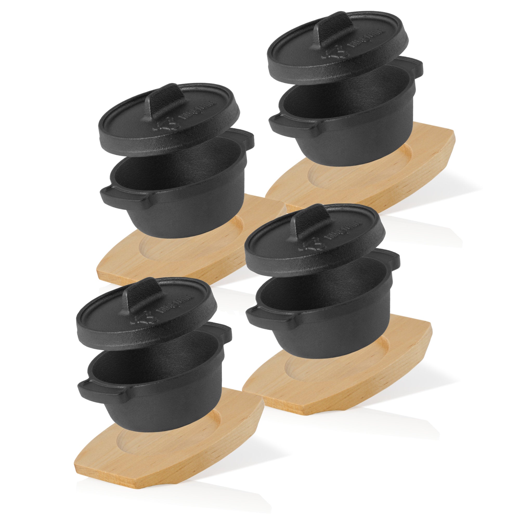 Mini cocotte en fonte, Ø 11 cm, avec socle en bois.