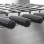 Charcoal grill with rotisserie attachment, 11 skewers, stainless steel, including motor.